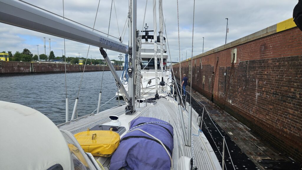 Yachts moored in a lock chamber in Kiel Canal