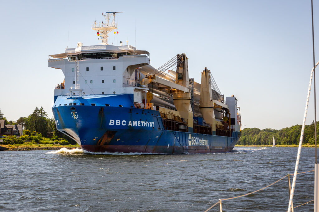 Cargo ship with wind turbines' wings in Kiel Canal