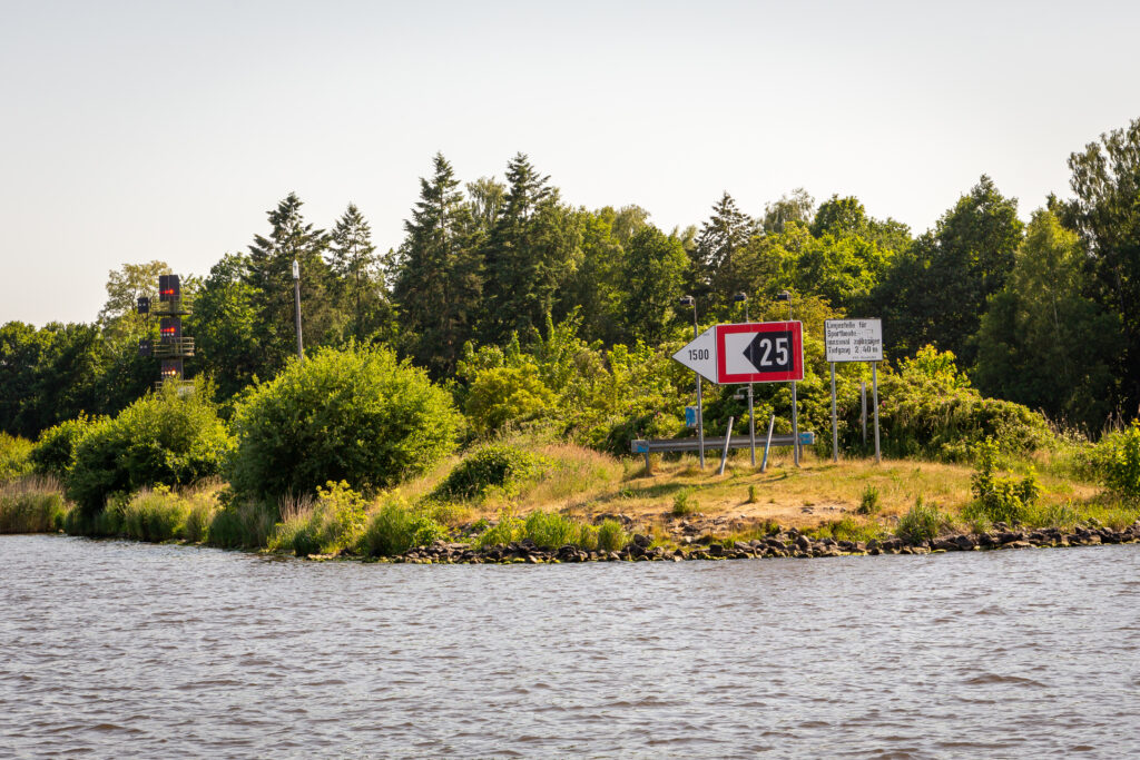 Sign indicating the minimum distance from the canal’s bank in Kiel Canal